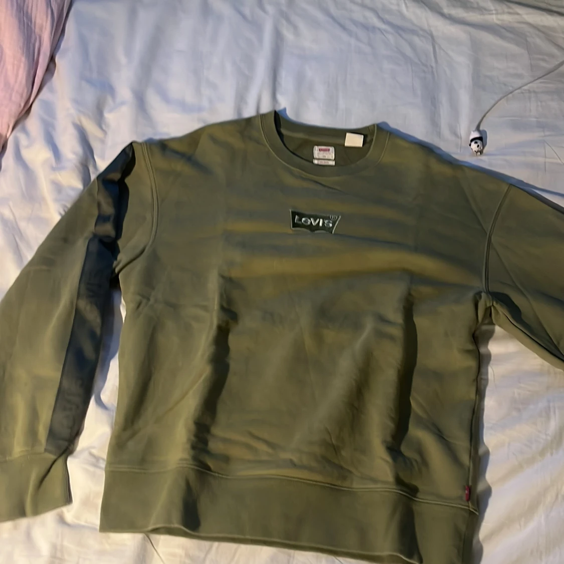 Olivgrön sweatshirt från Levi's XS
