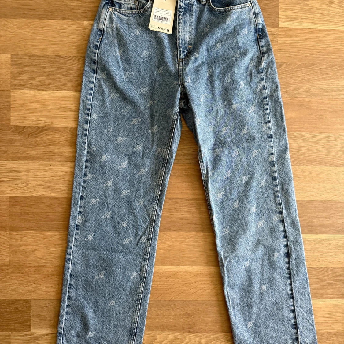 Axel Arigato ljusblå jeans med mönster - 1