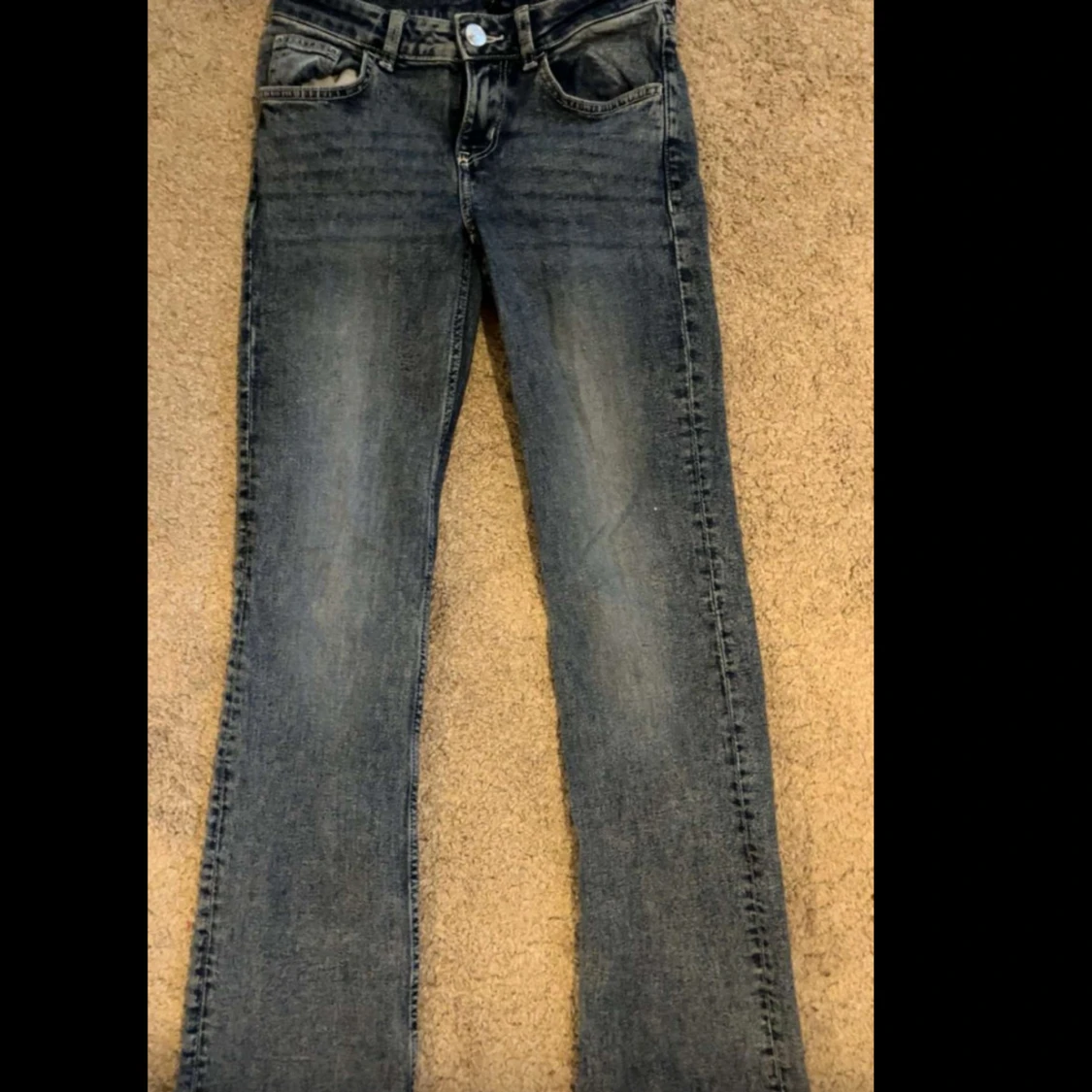 Blå bootcut jeans midwaist stl 32/xxs