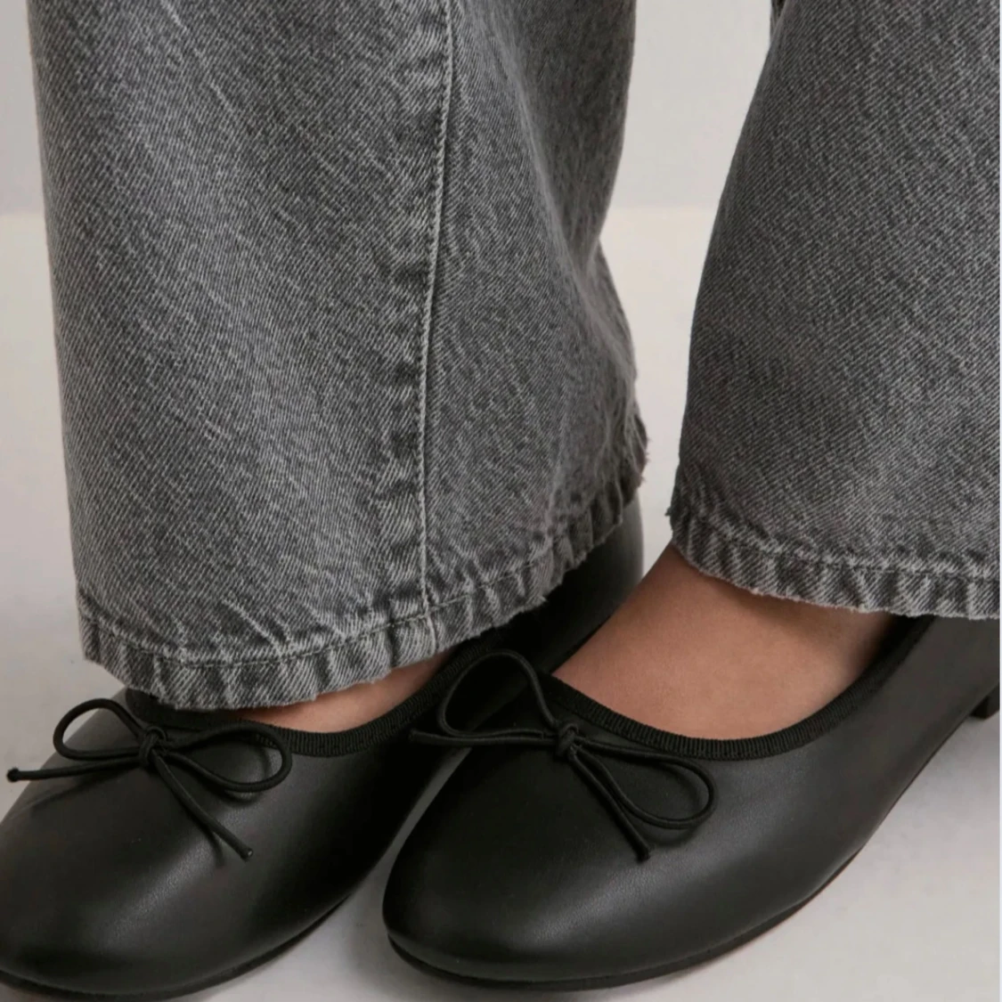 Svarta ballerinaskor med rosett - 1