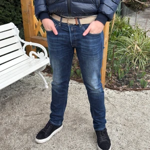 Beige bälte - Ett snyggt beige flätat bälte. Perfekt för både vardag och festliga tillfällen.