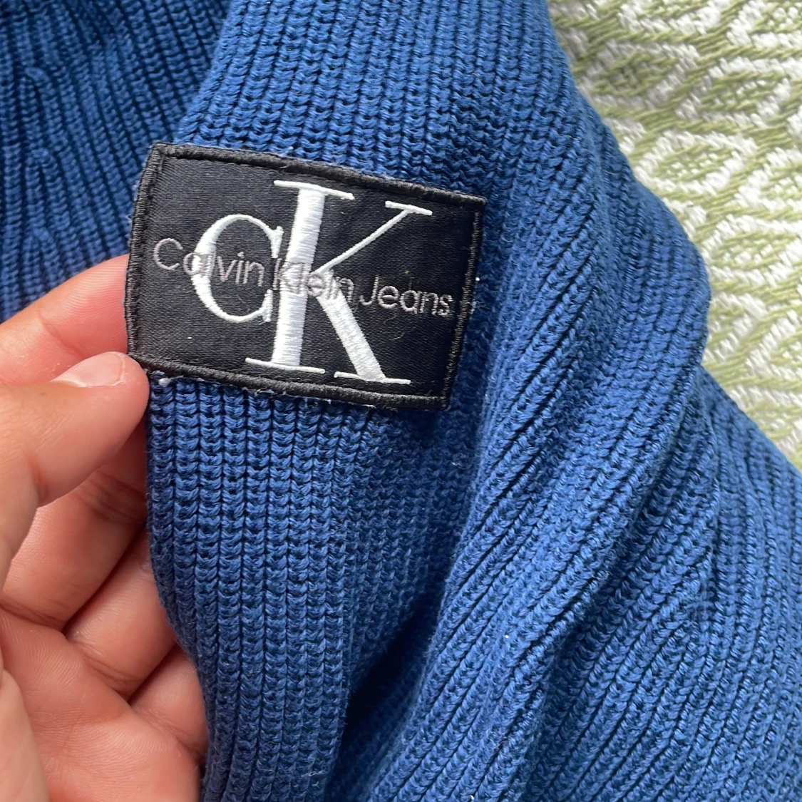 Blå stickad half zip från Calvin Klein - 1