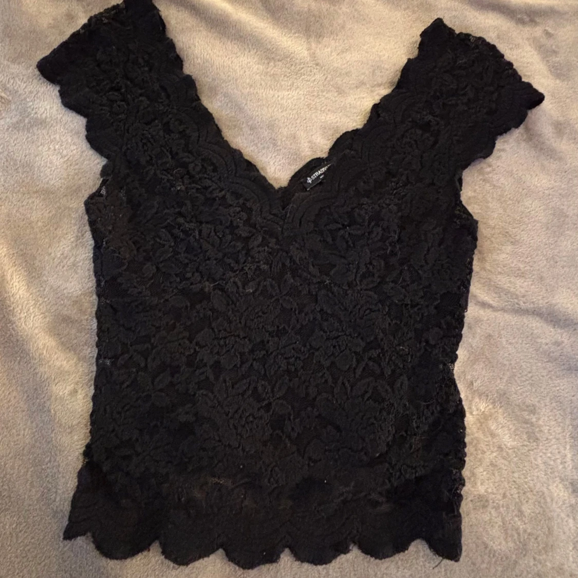 Svart spetstopp från Stradivarius