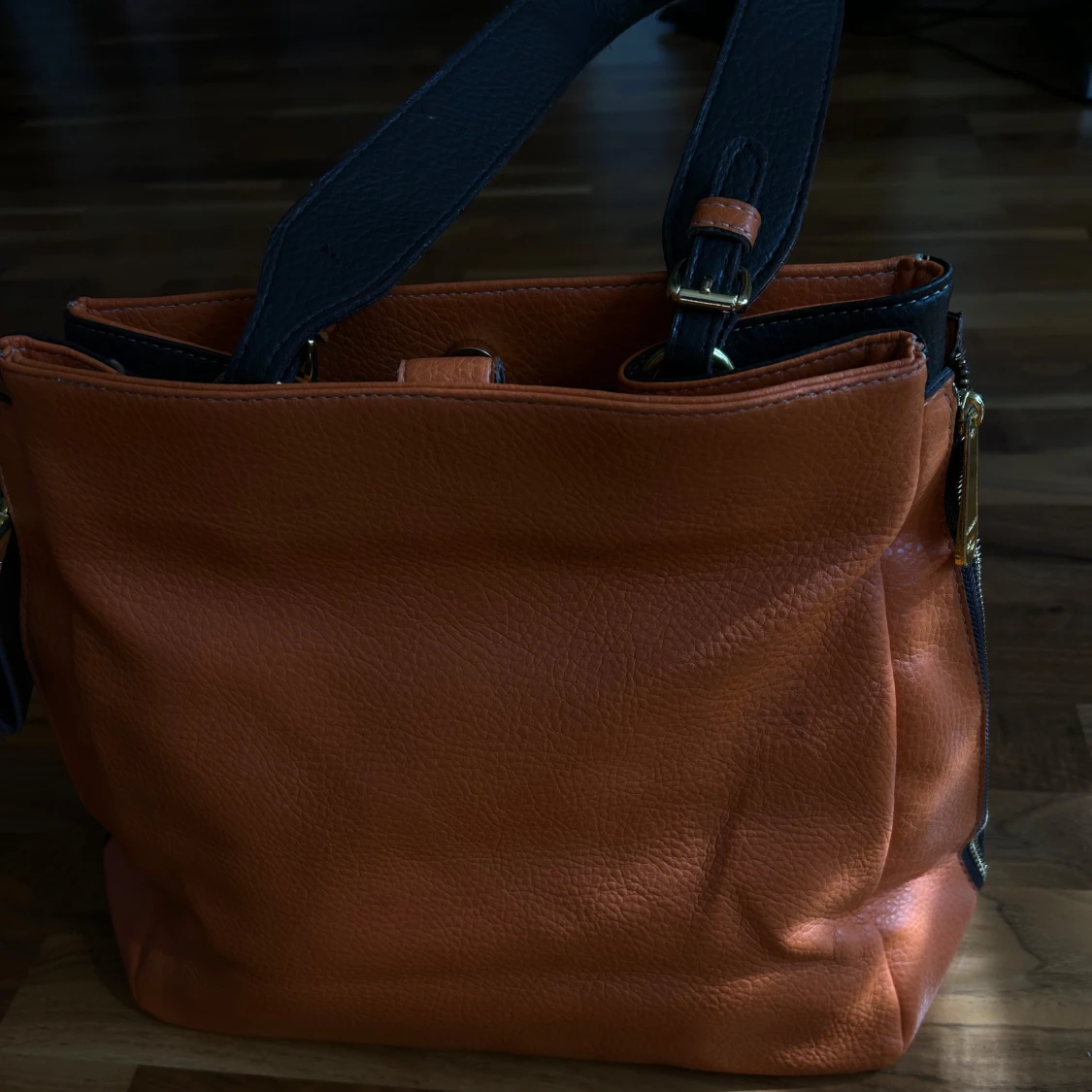 Orange handväska från Jil Sander