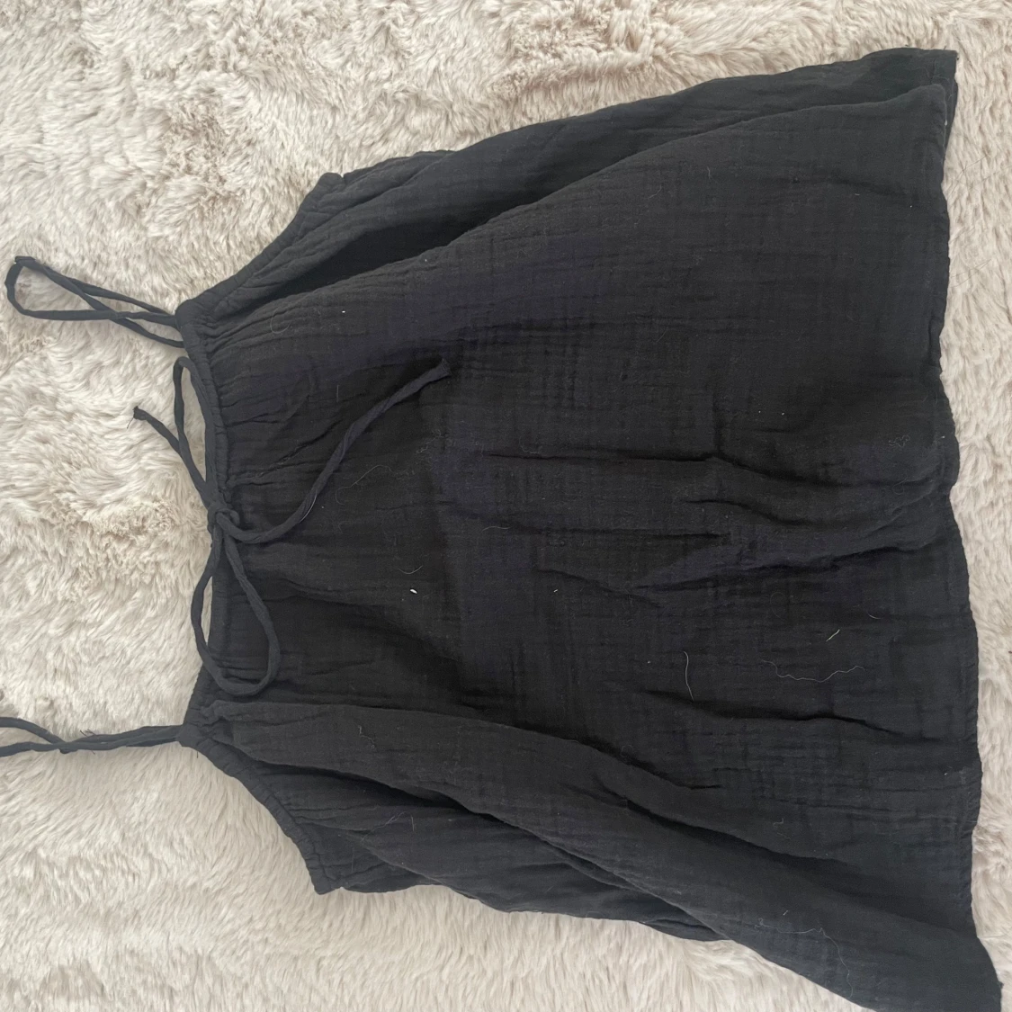 Svart ärmlös linnetopp - 2