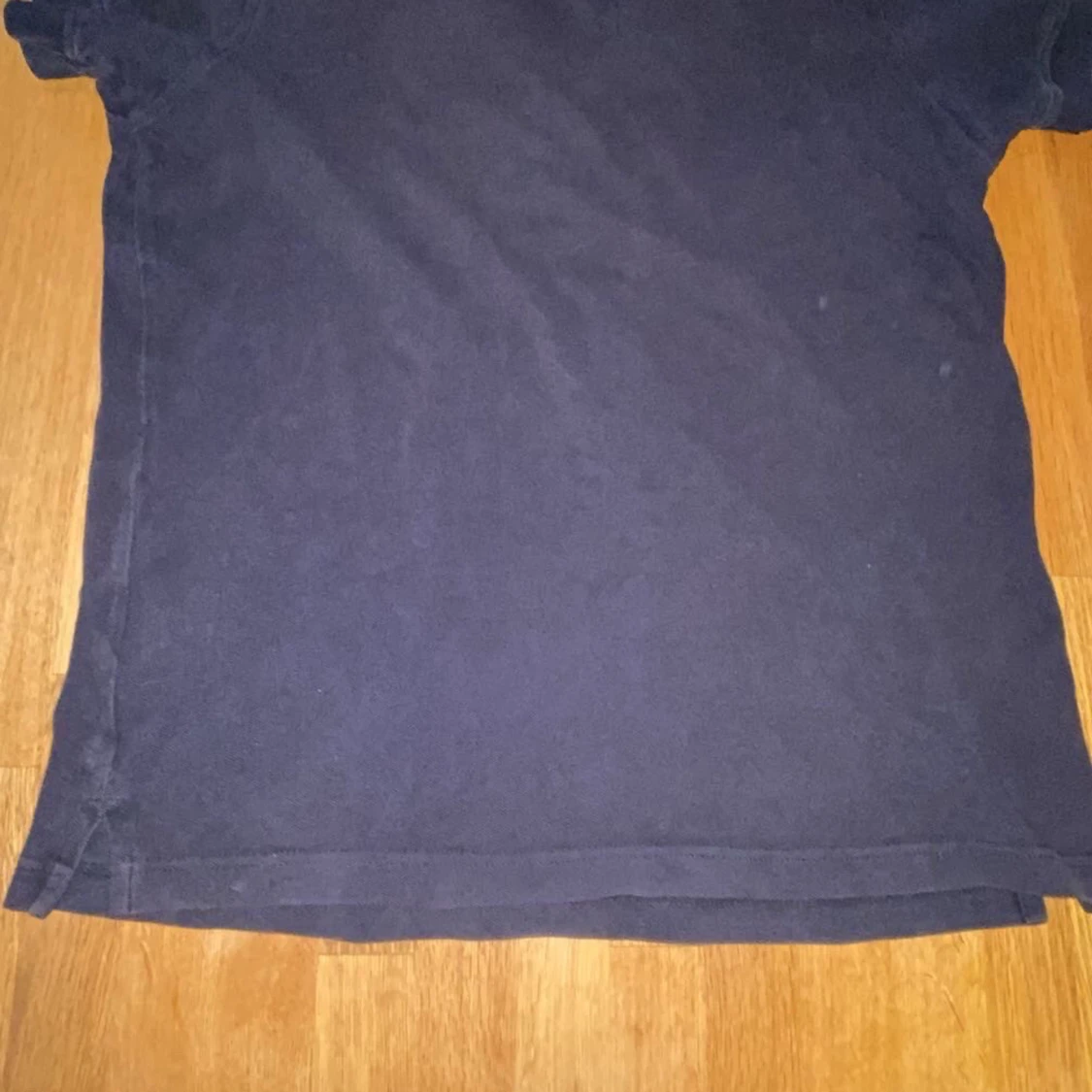 Mörkblå pikétröja från Lyle & Scott - 1