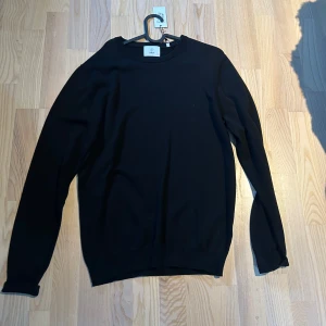 Stickad tröja  - Svart stickad tröja från bläck. Köptes på mq, helt oanvänd prislapp kvar😎 nypris 599