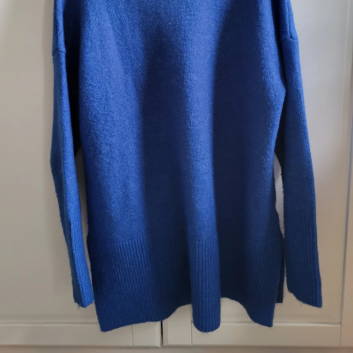 Blå stickad polotröja från Indiska - 1
