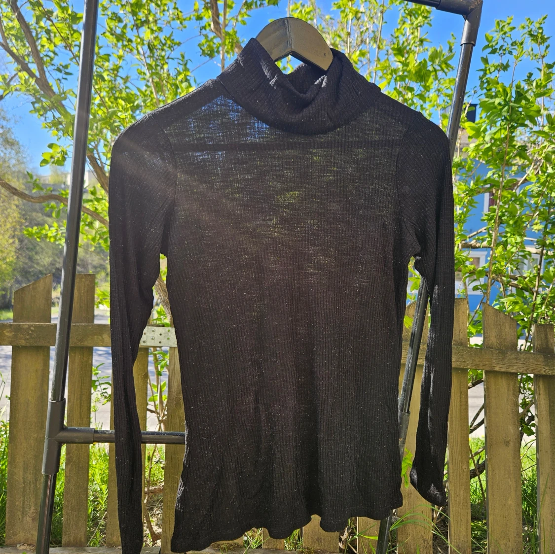 Svart transparent polotröja