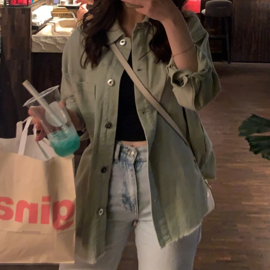 Grön jacka med knappar