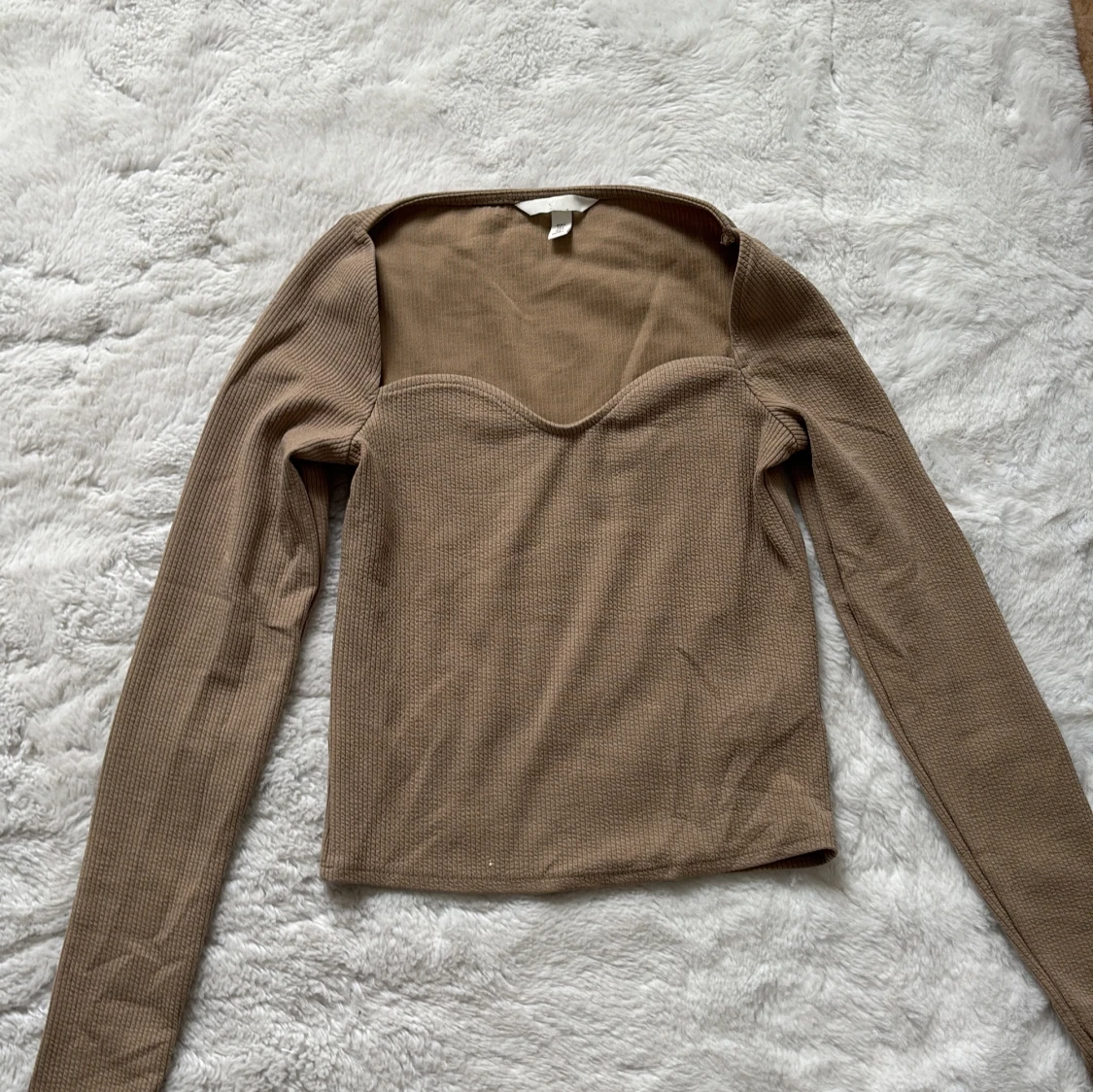Beige ribbad topp