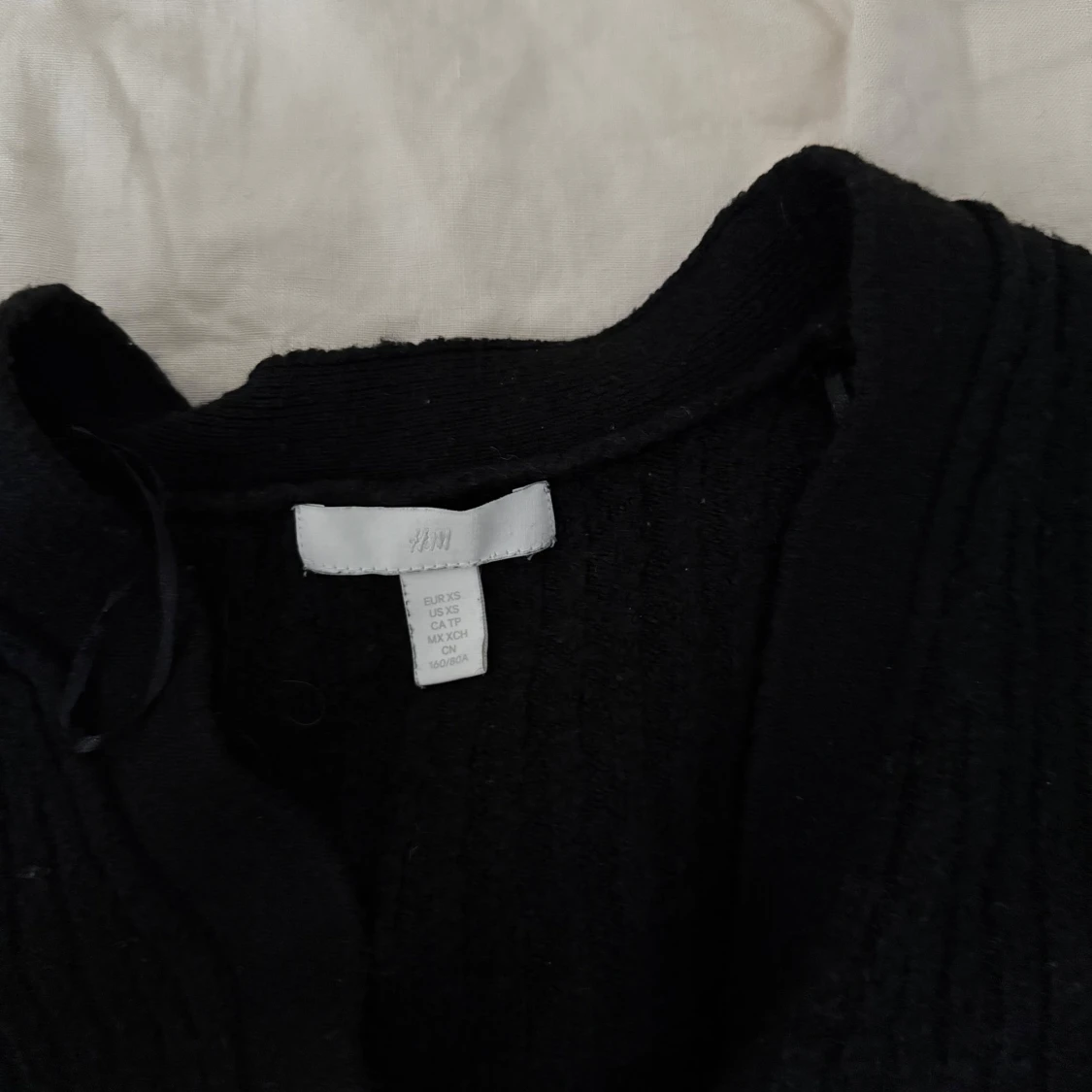 Svart ribbad kofta från H&M - 1