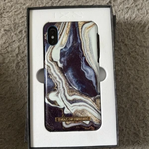 Blått ideal of Sweden skal - iPhone X/XS. Aldirg användt. Ordinarie pris mer än 200kr 