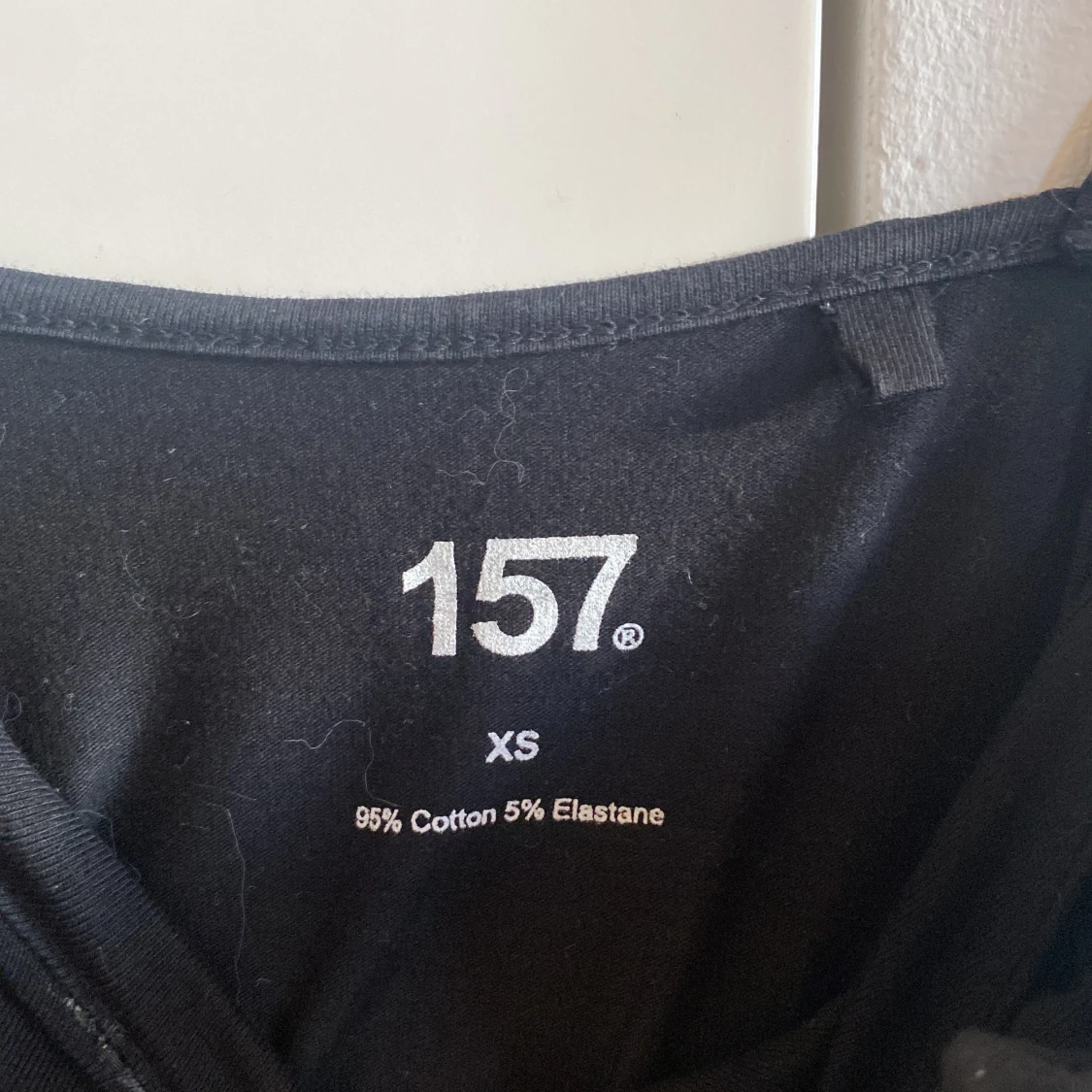 Svart linnetopp från 157 - 2