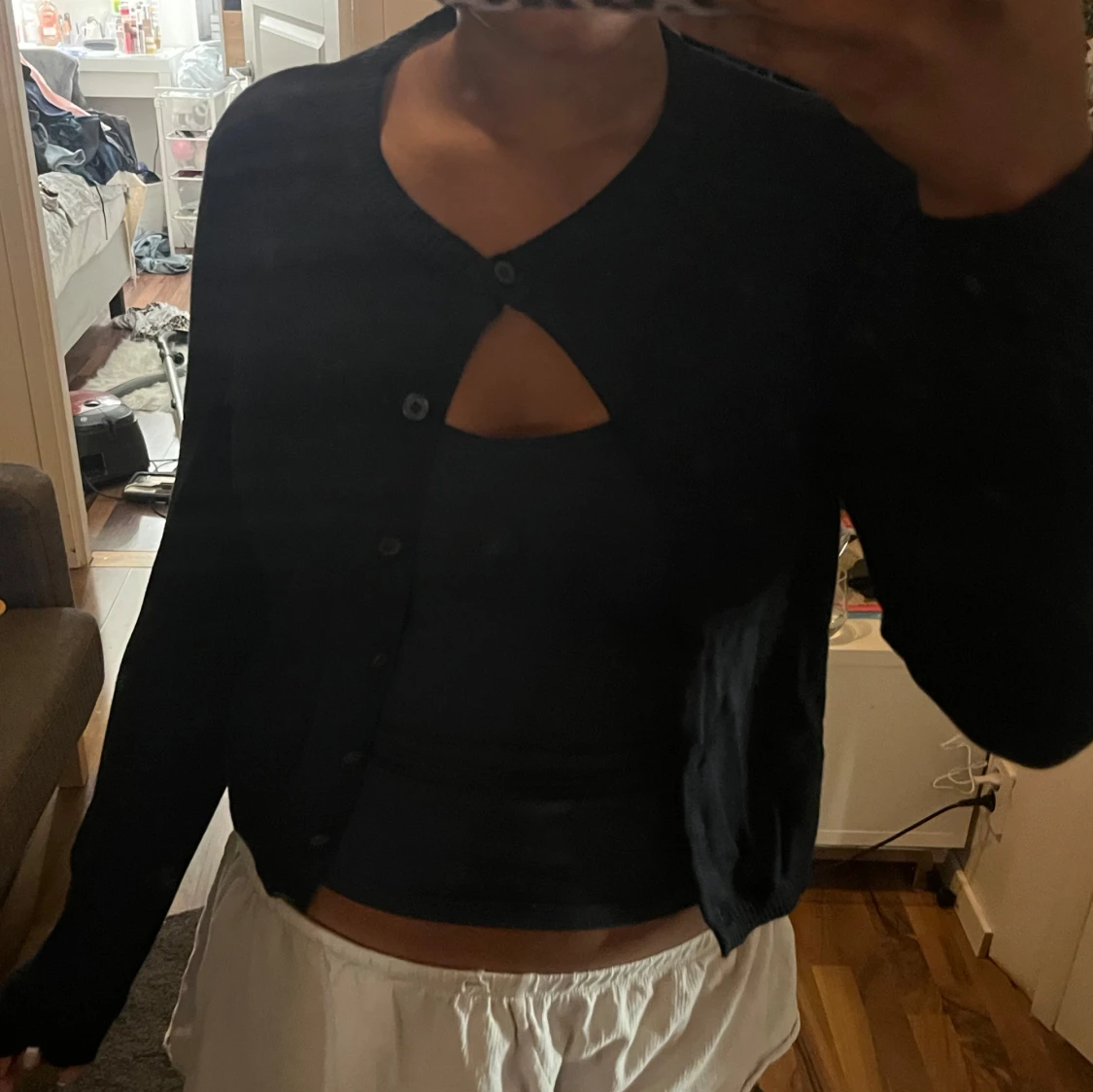 Svart kofta med knappar