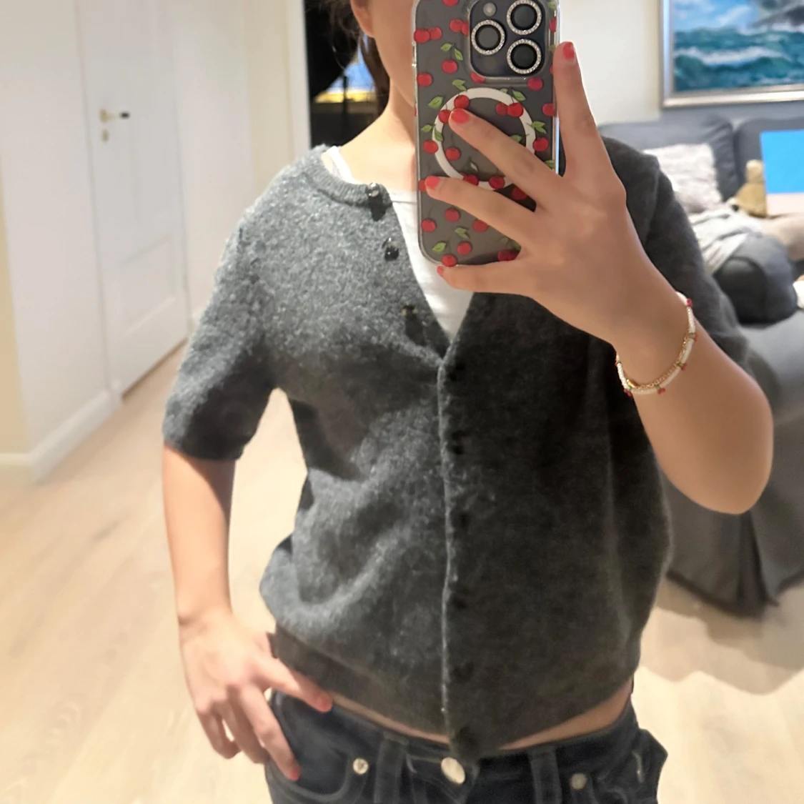 Grå stickad kofta med kort ärm