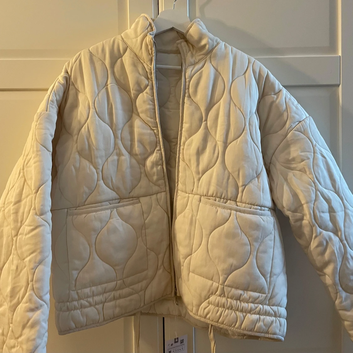 Beige quiltad jacka - 1