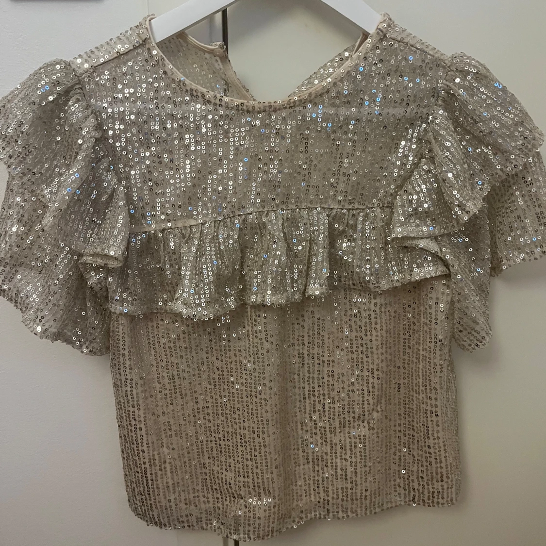  glittrig topp från Lindex