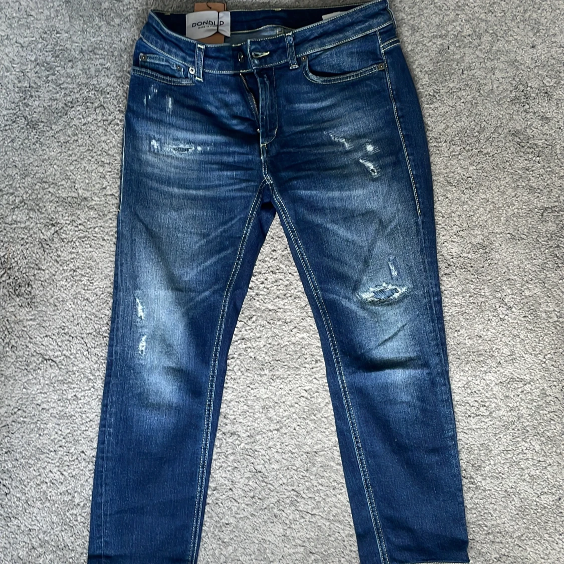 Slitna jeans från Dondup,