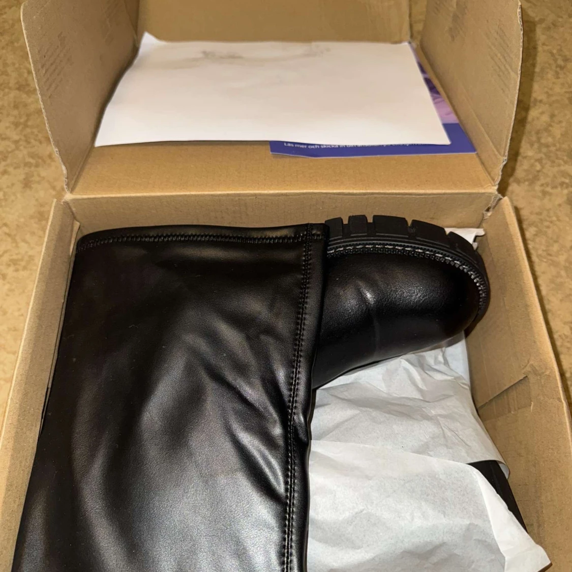 Svarta höga boots med platåsula