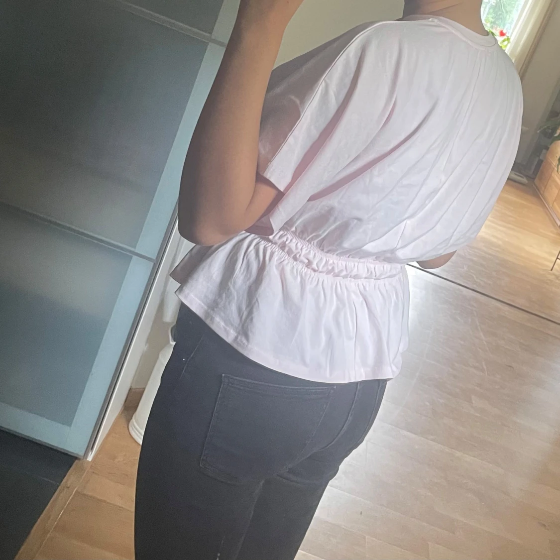 Ljusrosa blus med resår i midjan - 1