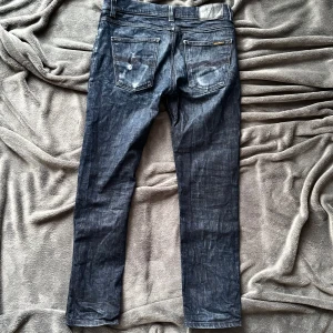 Nudie jeans  - Nudie jeans I fint skick | modell: lean Dean (slim fit | tvärs över midjan: 41 cm , längd på hela byxan: 97 cm | w30 l31 | fraktar spårbart📦