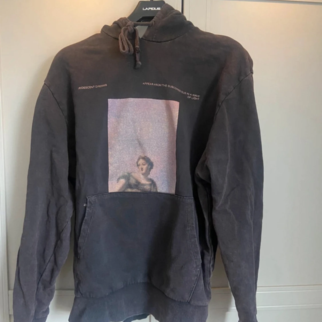 Svart hoodie med tryck från Collusion