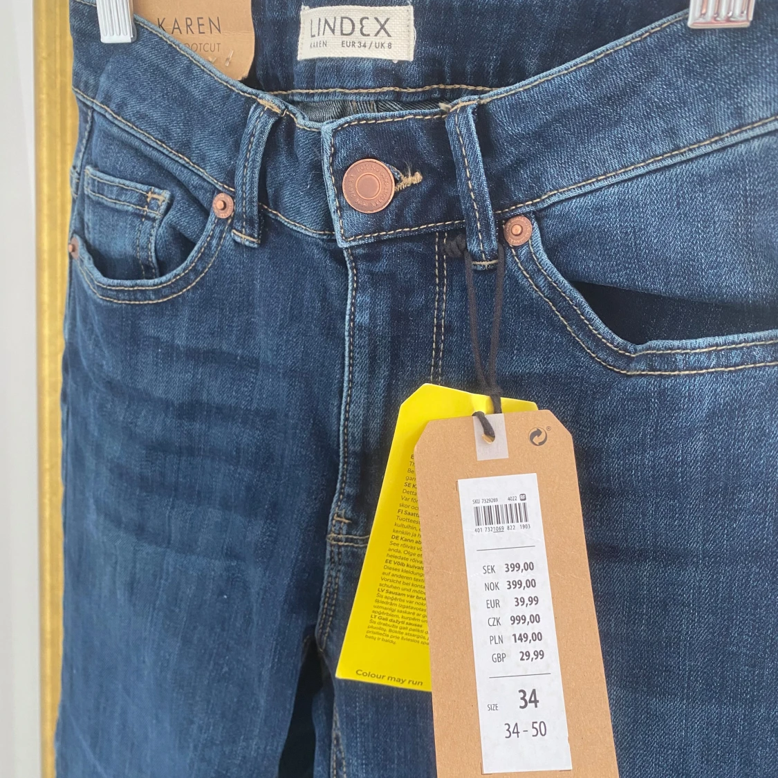 Blå bootcut jeans från Lindex - 2