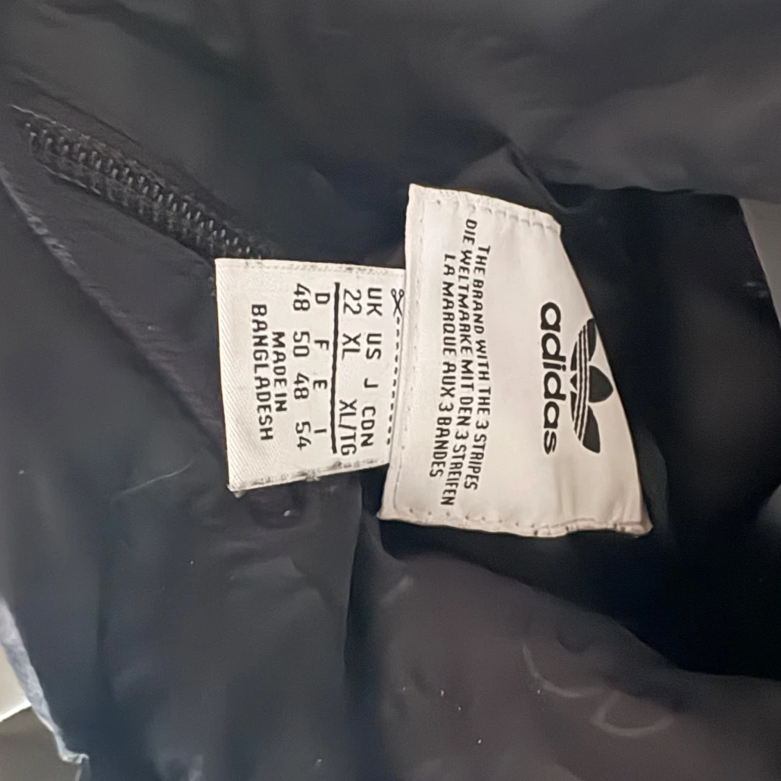 Svart dunjacka från Adidas - 1