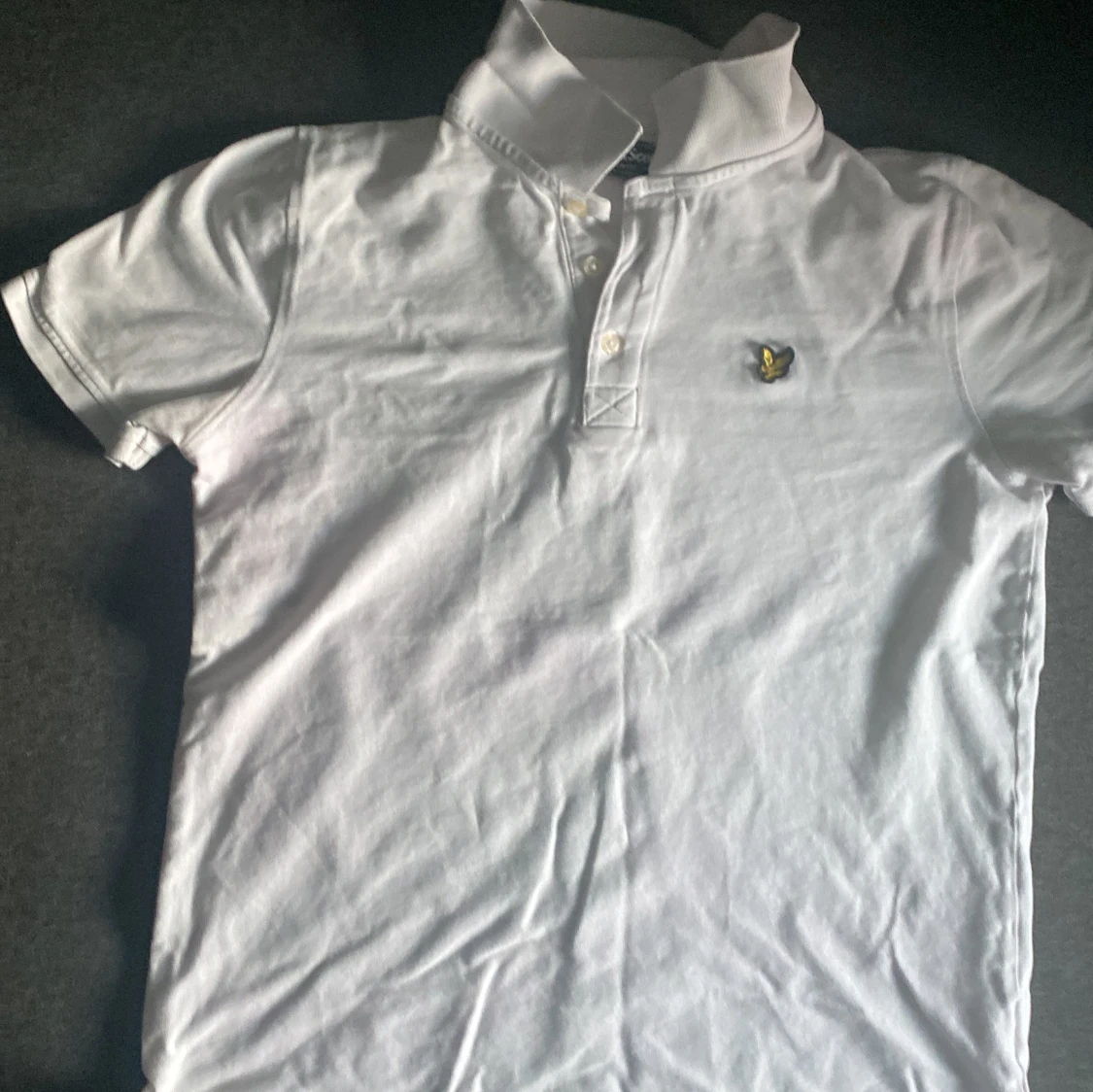 Vit kortärmad pikétröja från lyle&scott