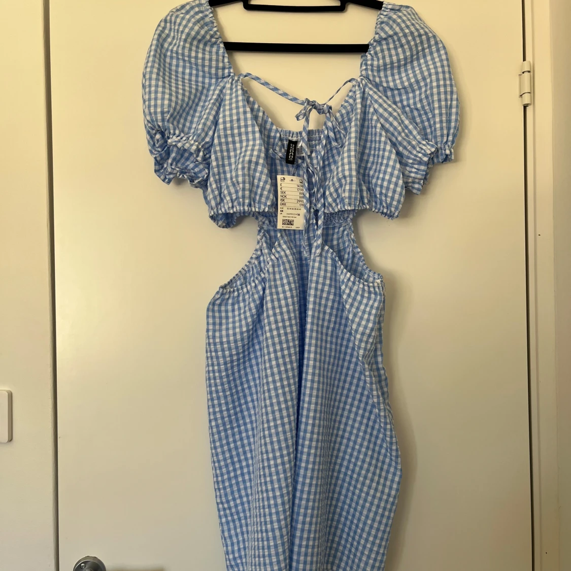 Ny blåvit rutig klänning H&M strl 44