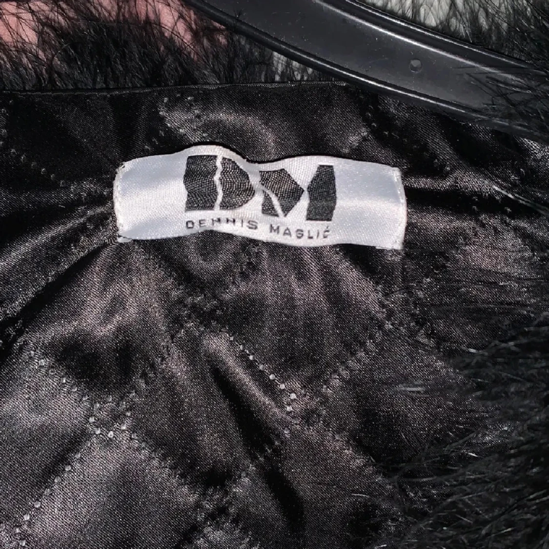 Svart fjäderjacka från Dennis Maglic - 1