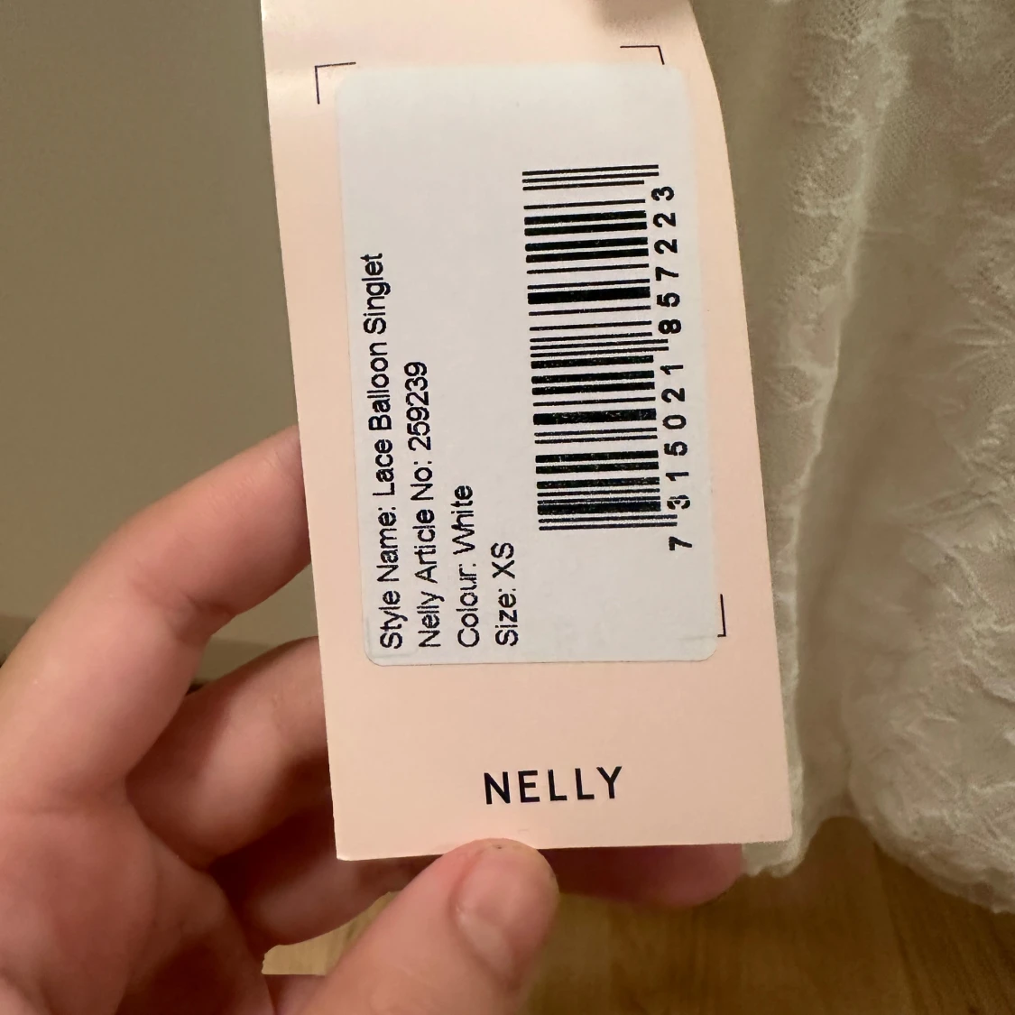 Vit spetslinne med volang från Nelly - 4