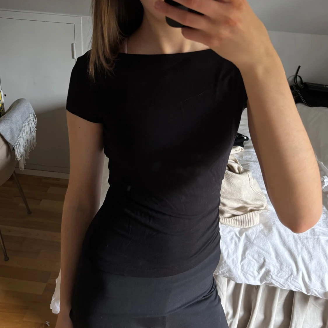 Svart topp med öppen rygg