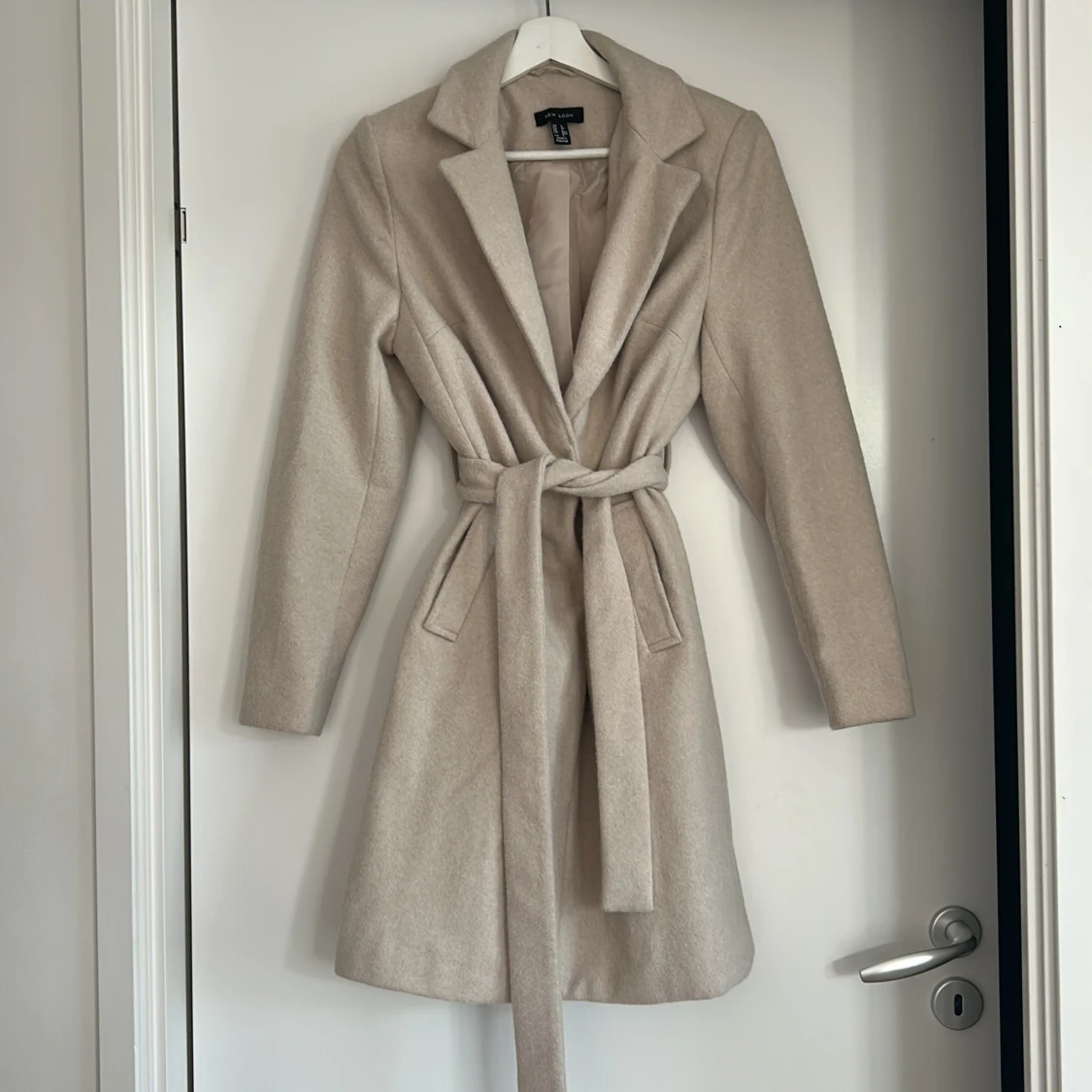 Beige kappa från New Look