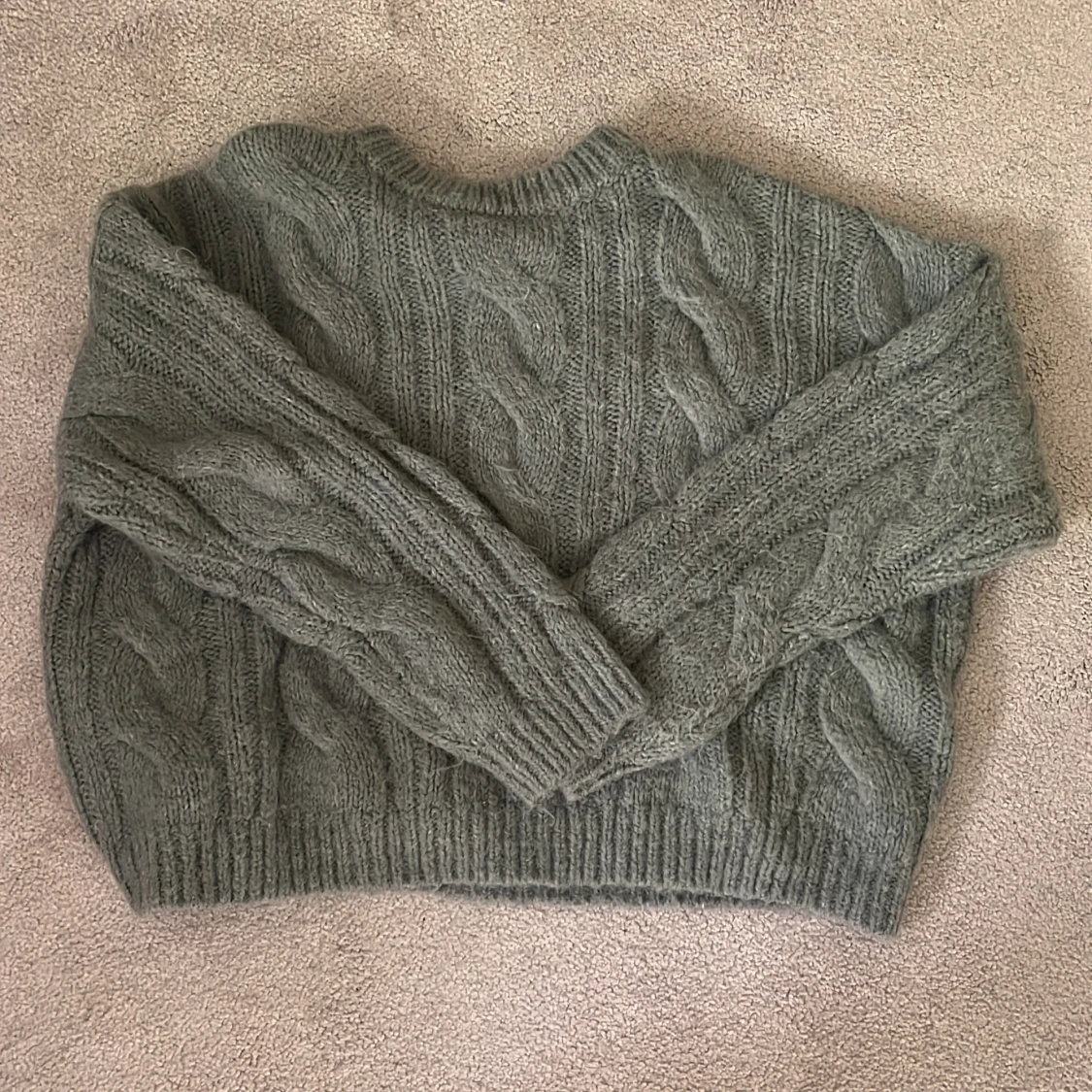 Grön stickad tröja från Envii