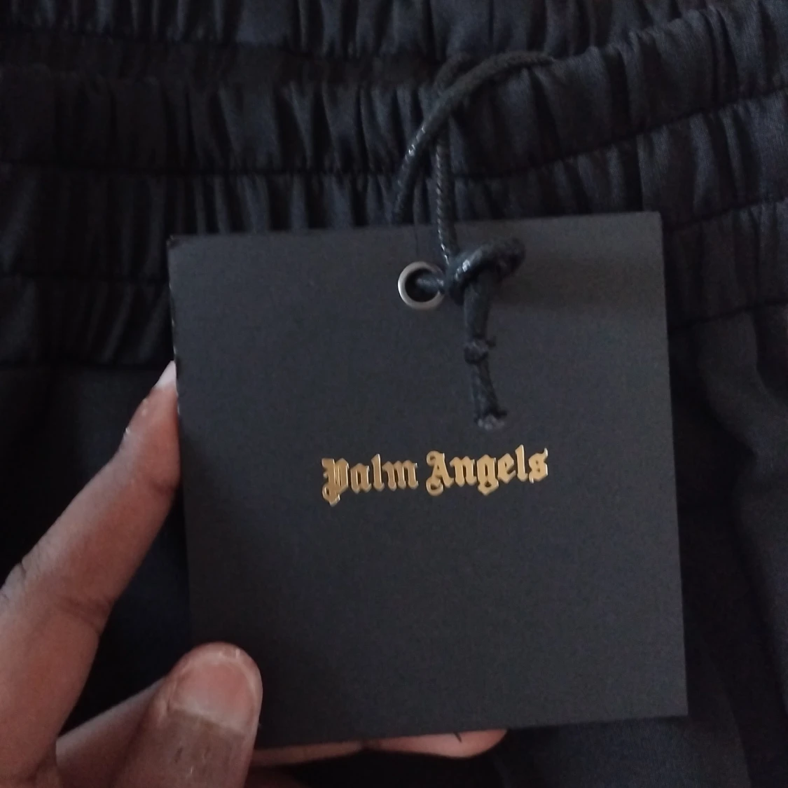 Svarta shorts från Palm Angels med vit rand - 1