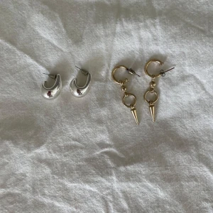 Örhängen (guld och silver) - Säljer två par örhängen i guld och silver ifrån ur & Penn. Örhängena är använda få gånger och är i mycket bra skick💗