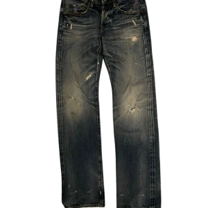 Hysteric glamour - Coola svarta jeans med slitningar och en avslappnad look. De har en klassisk femficksdesign och en rak passform som ger en tidlös stil. Perfekta för en casual outfit.