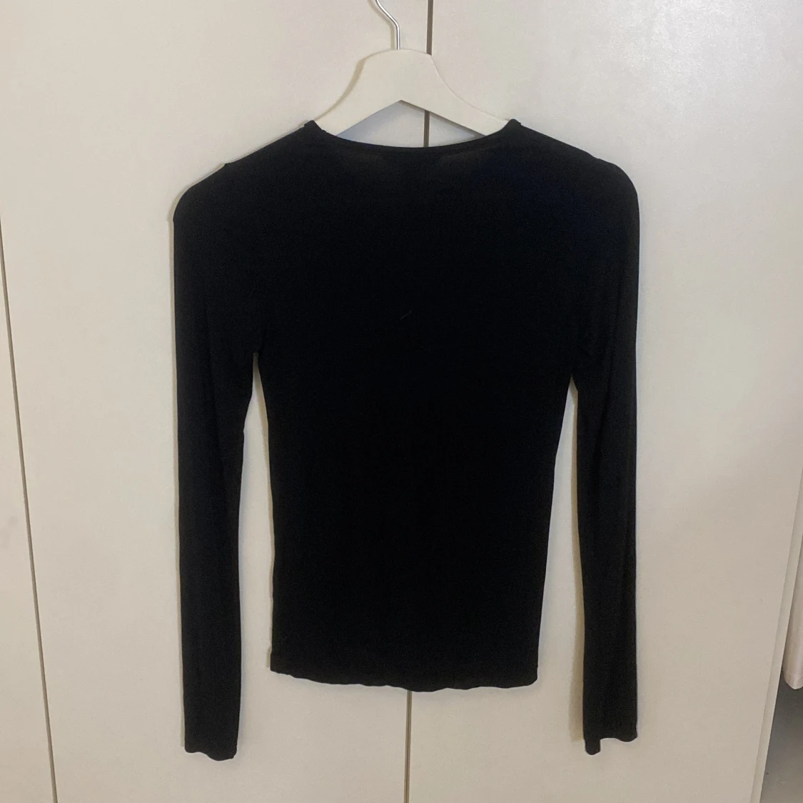 Svart långärmad topp - 1