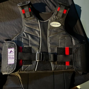 Ridväst  - knappt använd