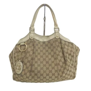 Vintage Gucci väska - DETALJER Ursprung: Italien Material: canvas och läder Färg: brun Tillbehör: inga  FÖRUTSÄTTNING​ Utsida: I gott skick, med några tecken på användning. Tårar.    Insida: I gott skick, med några tecken på användning.  