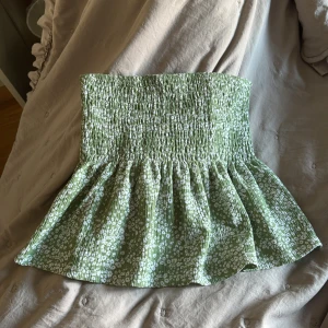 Bandeau peplum topp - Topp från gina i strl m passar s