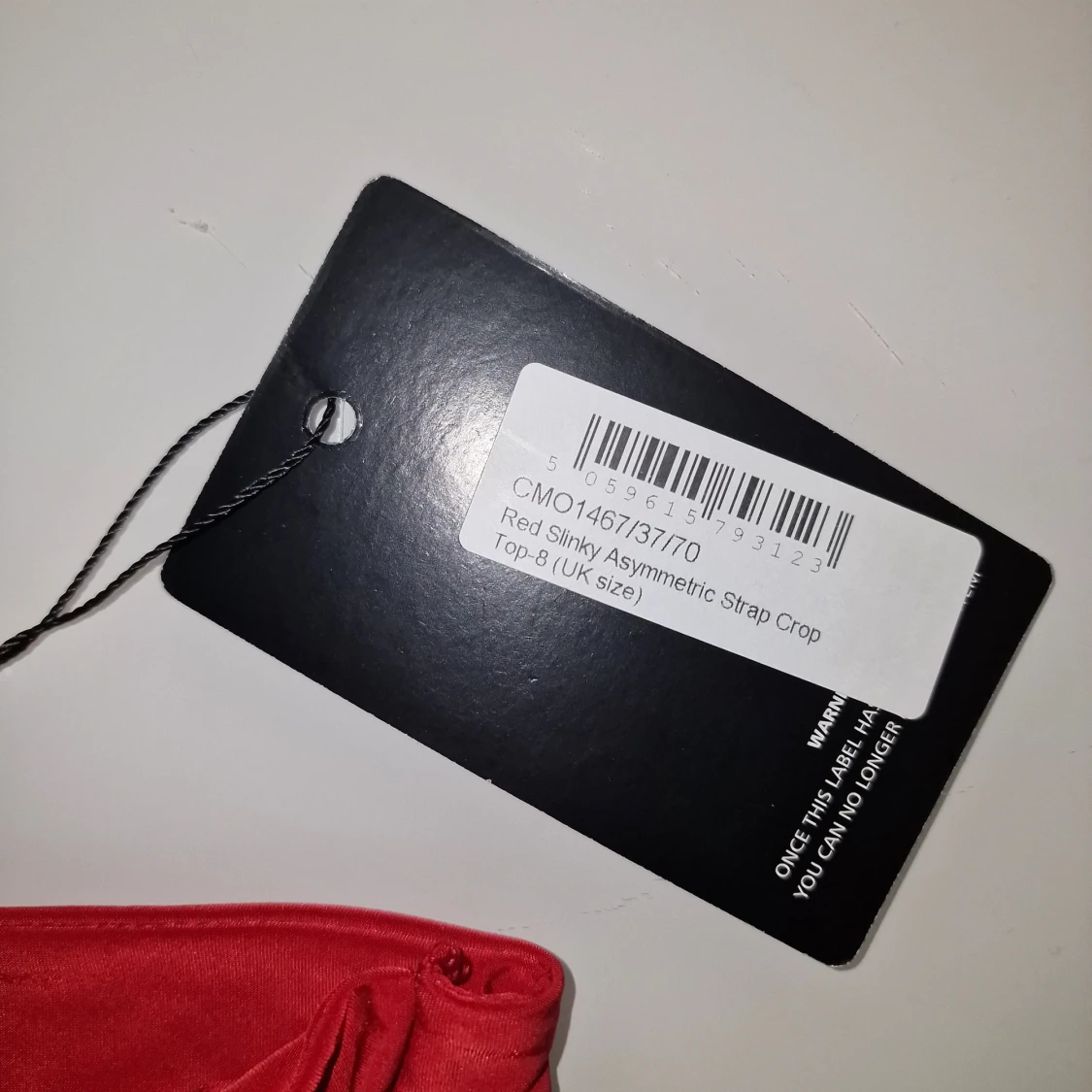 Röd asymmetrisk topp - 92