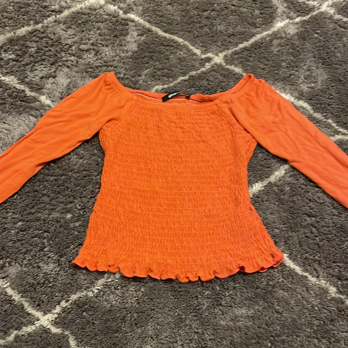 Orange topp från Gina Tricot