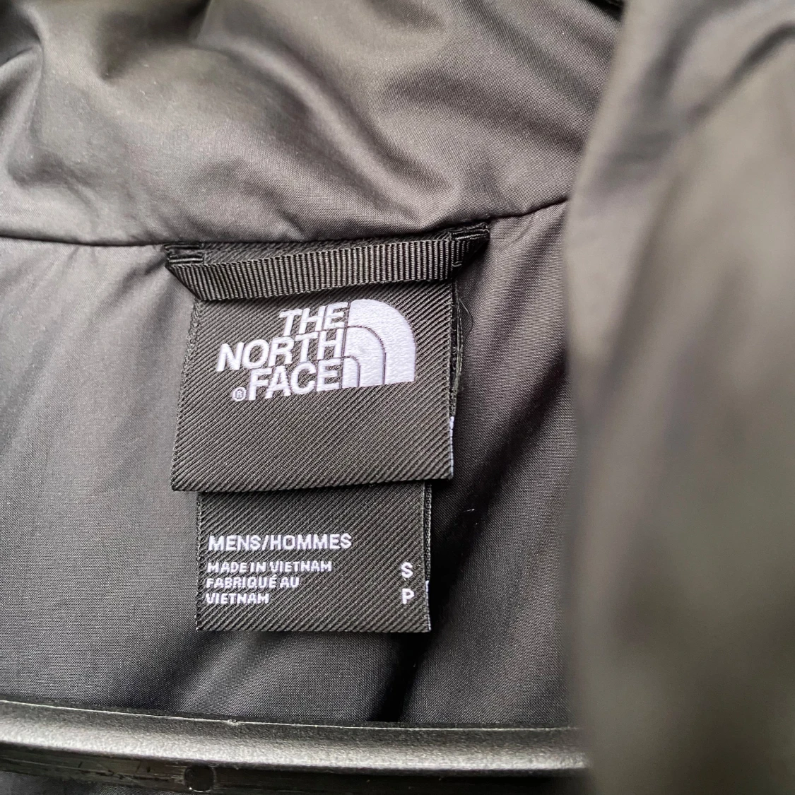 Svart dunväst från The North Face - 2