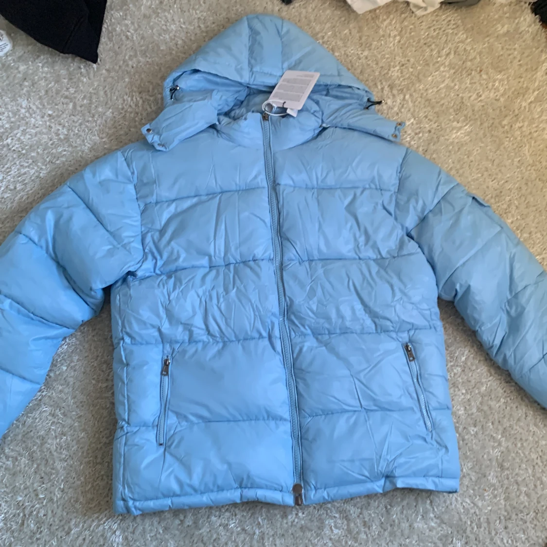 Ljusblå dunjacka från Moncler