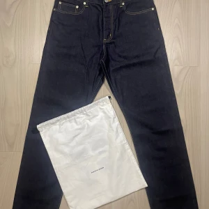 Beautiful People Japanese selvedge denim - 12 OZ Japanese raw selvedge denim from a Japanese brand called beautiful people. Size 42, fits like M. New price 270€ (3050 SEK). Extremely high quality jeans that will last long. Condition is new, unused. Comes with the original bag.