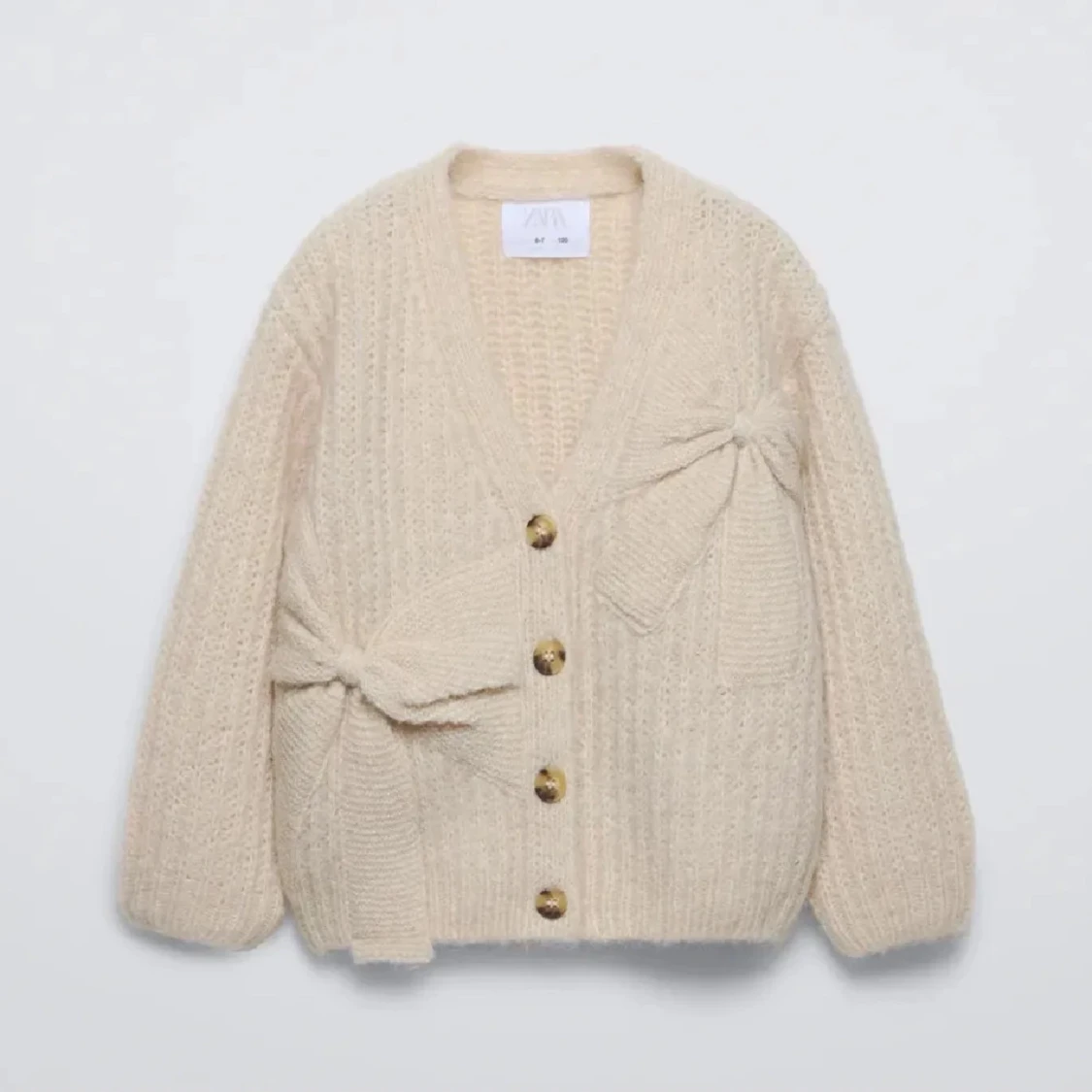 Stickad kofta med knappar - 1