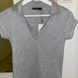 Polotröja - Polotröja/t shirt i nyskick 